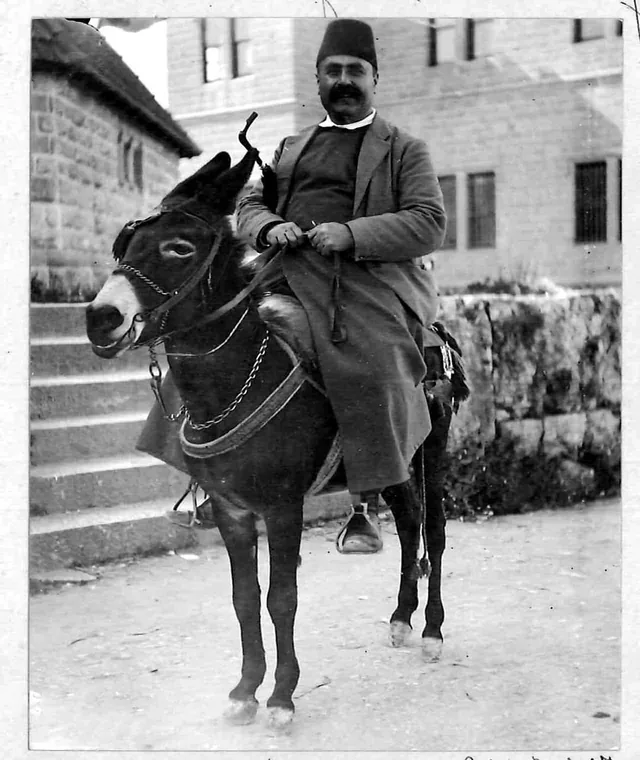 A rider and his donkey on a Beirut street