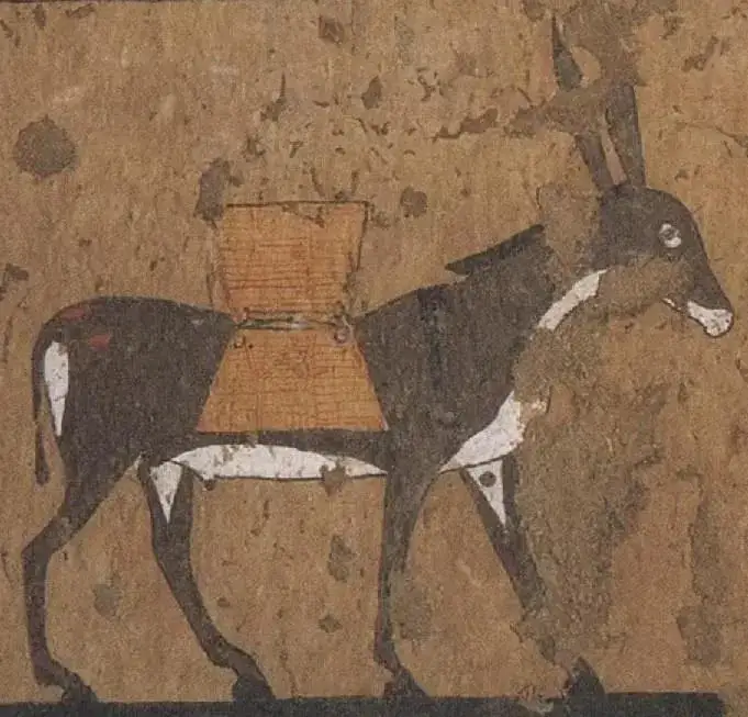 Egyptian tomb painting: a donkey with its load